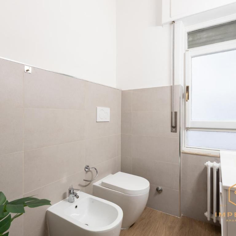 Imperium Garbatella Guesthouse - 2 bedrooms with private bathroom, Terrace, 800mt to metro - Superior Family Room - 16