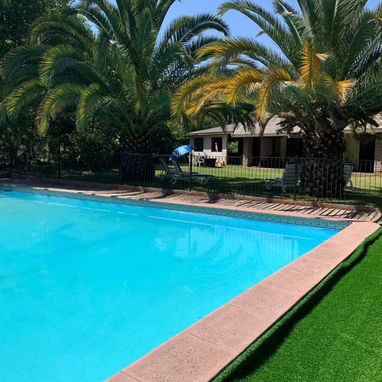 Parcela con Casa, Terraza, Piscina y Quincho en Pirque - Four-Bedroom House - 4