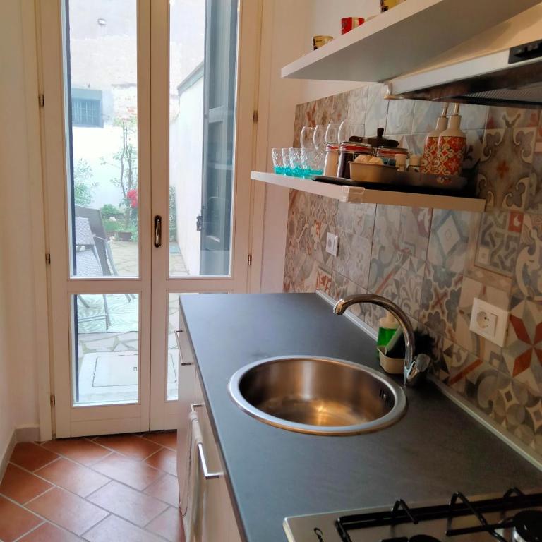 Casa del 131 - centrale con giardino - Appartamento con 1 Camera da Letto e Vista Giardino - 9