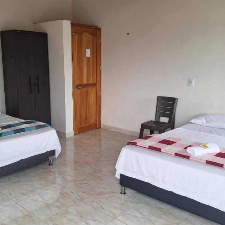 HOSPEDAJE VILLA SAMARA --- cerca de la piedra -- GUATAPÉ - Habitación Doble - 2 camas - 4