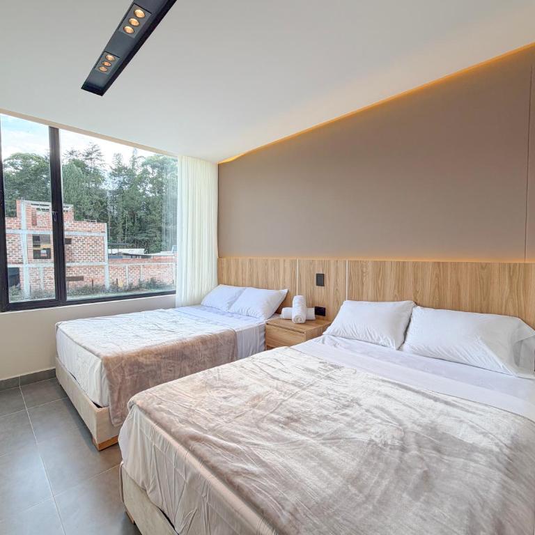 Apartamento de lujo a 3 minutos del Aeropuerto JMC 202 - Three-Bedroom Apartment - 5