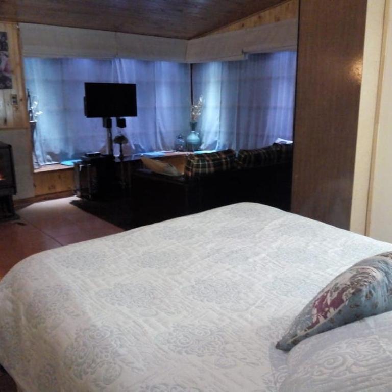 Cabaña Familiar con Jacuzzi Pétalos VillarricaTranquilidad a Minutos del Lago - Casa de 3 dormitorios - 7