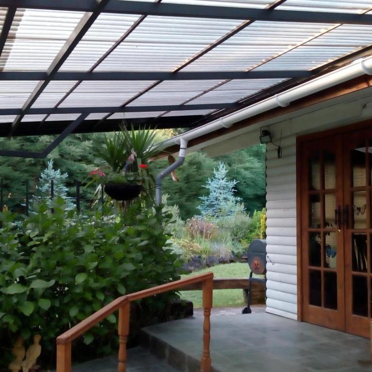 Cabaña Familiar con Jacuzzi Pétalos VillarricaTranquilidad a Minutos del Lago - Casa de 3 dormitorios - 1