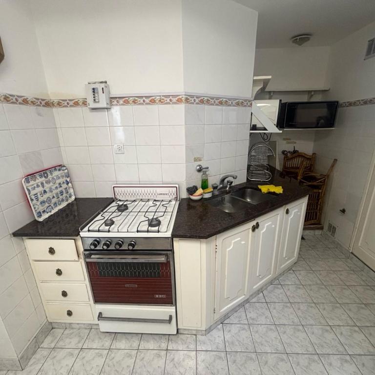 Excelente departamento de 4 ambientes en Playa Grande - Apartamento de 1 dormitorio - 8