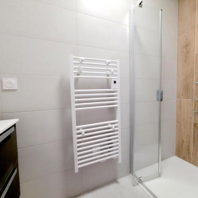 Incroyable T3 neuf avec garage - Proche de tout ! - Appartement 3 Chambres - 11