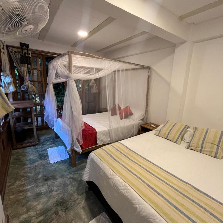 Casa Kwalama - Habitación Doble con vistas al jardín - 12