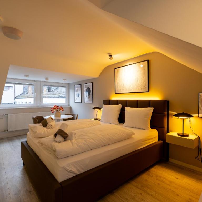 City Penthouse Apartments in Bahnhofsnähe - Apartment mit 1 Schlafzimmer und Terrasse - 2