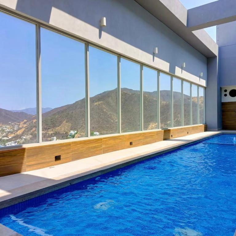 Apartamento con vista al mar en El Rodadero Santa Marta - Three-Bedroom Apartment - 40