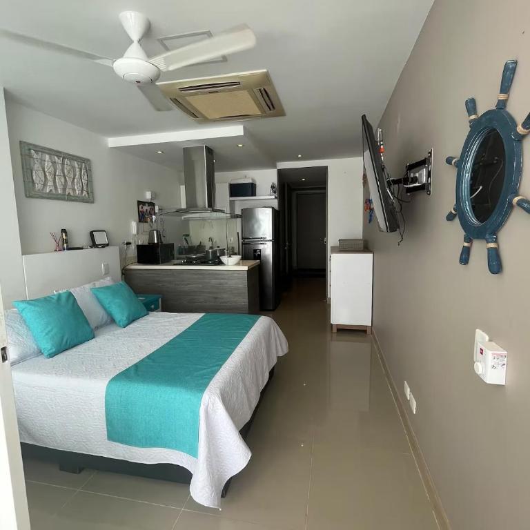 Apartaestudio con hotel y playa - One-Bedroom Apartment - 2