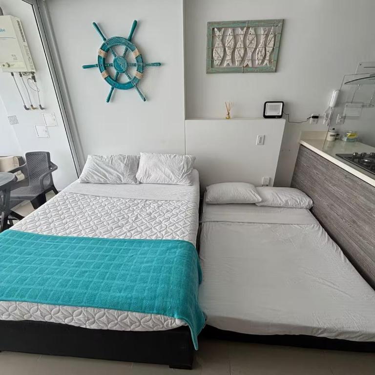 Apartaestudio con hotel y playa - One-Bedroom Apartment - 63
