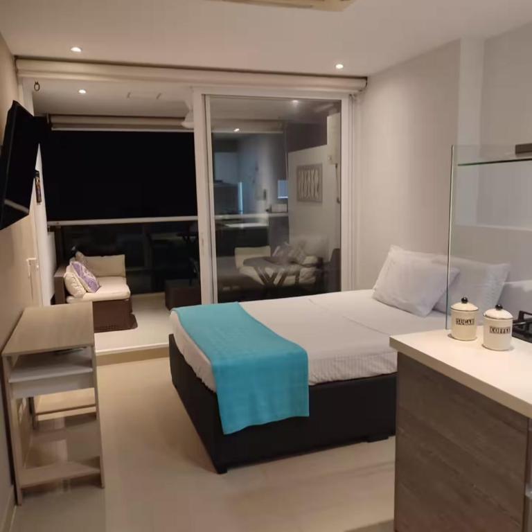 Apartaestudio con hotel y playa - One-Bedroom Apartment - 60