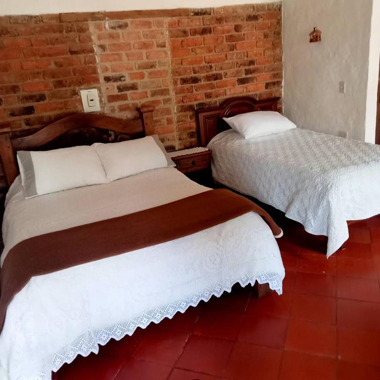 Acogedora casa rodeada de paisajes y jardines-Estancia Nirvana - Two-Bedroom House - 14