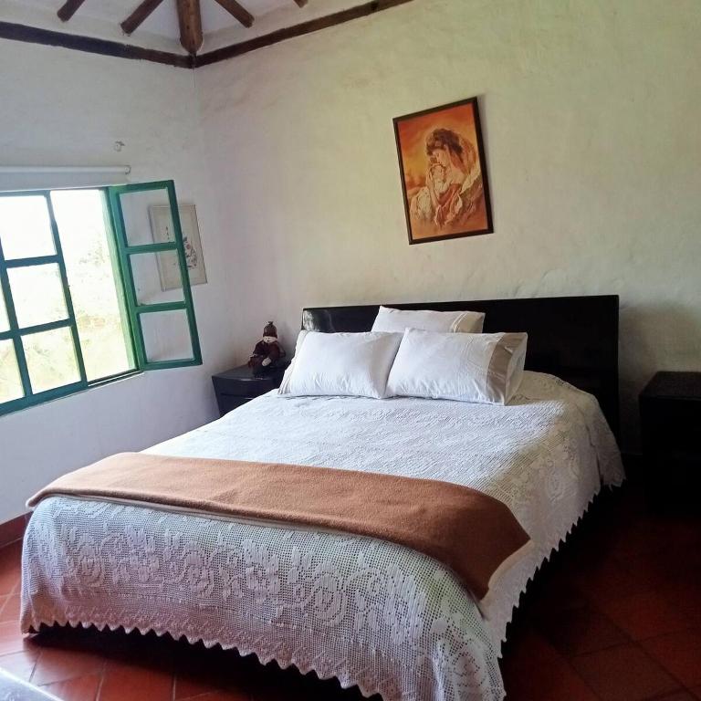 Acogedora casa rodeada de paisajes y jardines-Estancia Nirvana - Two-Bedroom House - 12