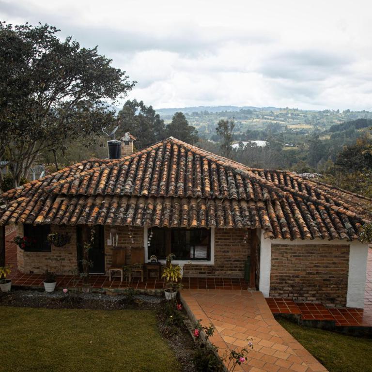 Acogedora casa rodeada de paisajes y jardines-Estancia Nirvana - Two-Bedroom House - 16
