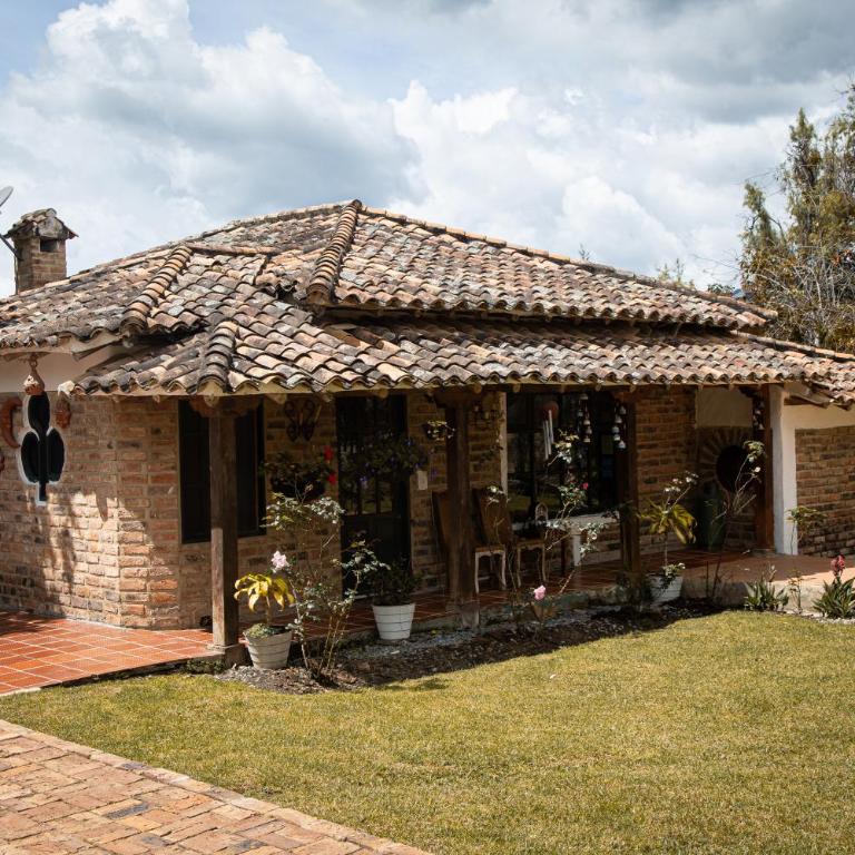 Acogedora casa rodeada de paisajes y jardines-Estancia Nirvana - Two-Bedroom House - 18