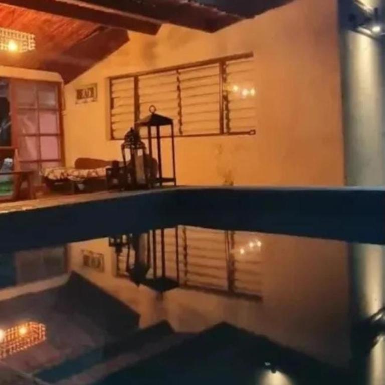 Casa con piscina y vista a la Laguna - One-Bedroom House - 1