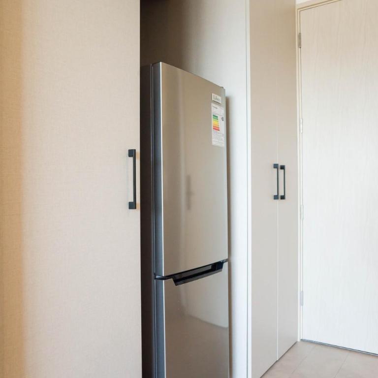 Cozy 1BR Getaway for Three in Vibrant Nunoa - Apartment - 24