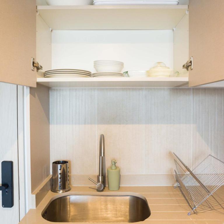 Cozy 1BR Getaway for Three in Vibrant Nunoa - Apartment - 25