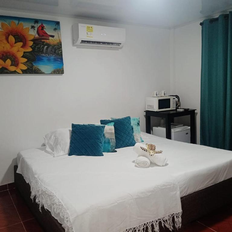 Posada Mr Buku Blue Room - Habitación Deluxe con cama extragrande - 1