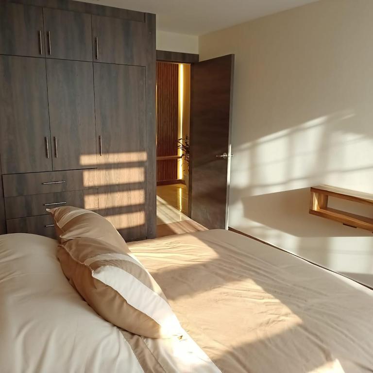 Departamento azul de 2 hab en la Victoria, cerca de universidades con garaje - Two-Bedroom Apartment - 16