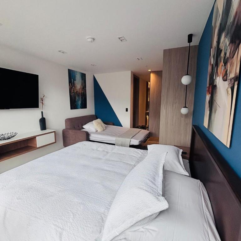 Suite exclusiva, piscina, sauna, turco, jacuzzi en área comercial de Quito - One-Bedroom Apartment - 19