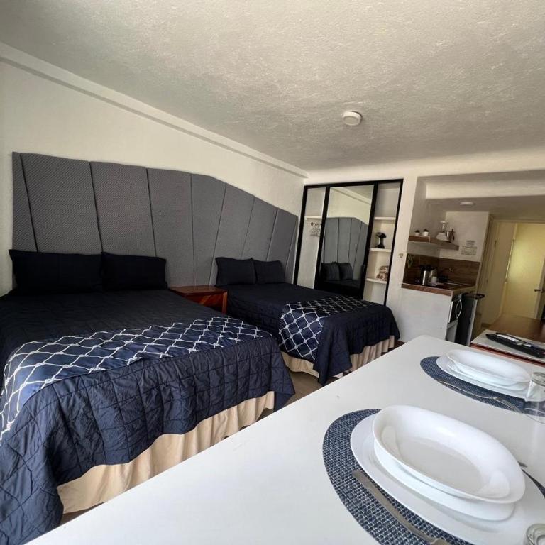 SKY INN Oficial Acapulco Suites & Condo Mediterrane - Habitación Doble - 2 camas - 4