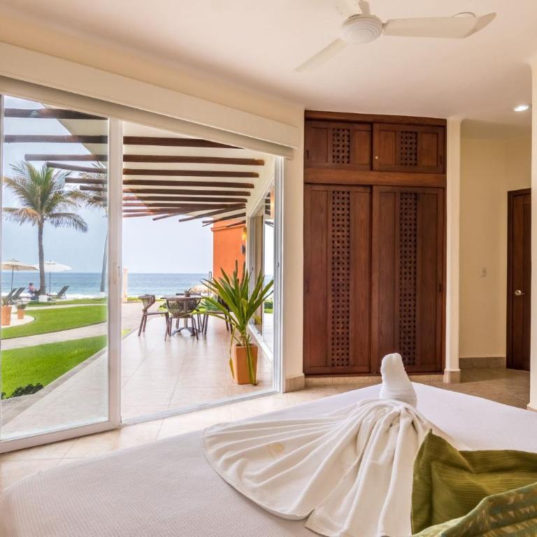 Beachfront in a peaceful Resort 8mi from Puerto Escondido - Apartamento de 2 dormitorios con vistas parciales al océano - 11