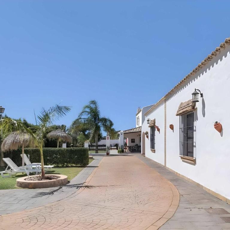 Casa con piscina compartida en Conil de la Frontera - Apartamento - 26