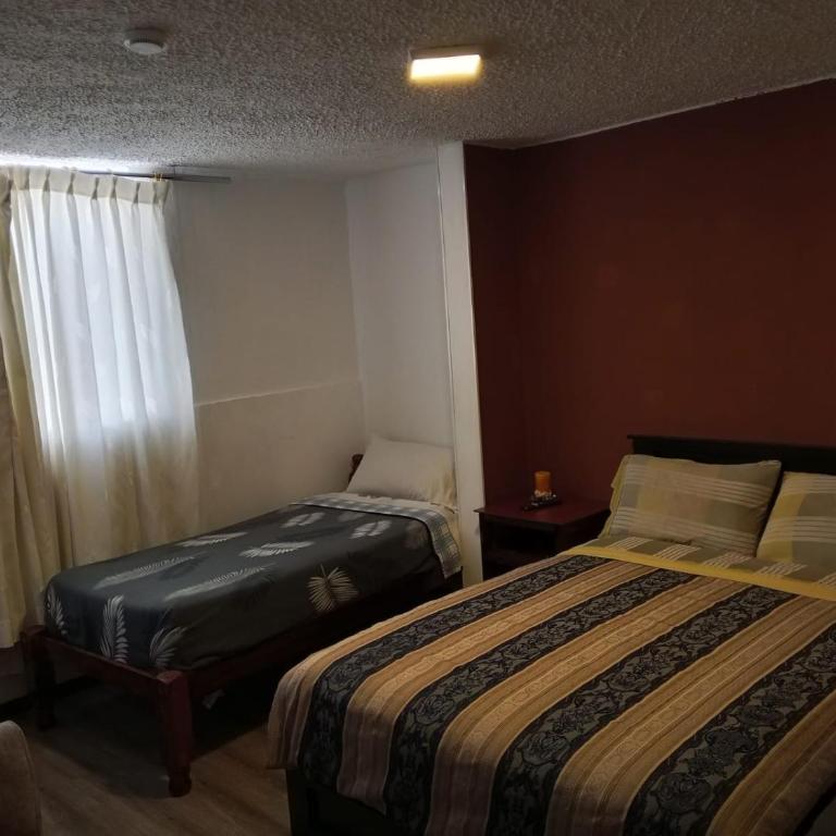 CALU Hostal - Habitación Doble - 2 camas - 2