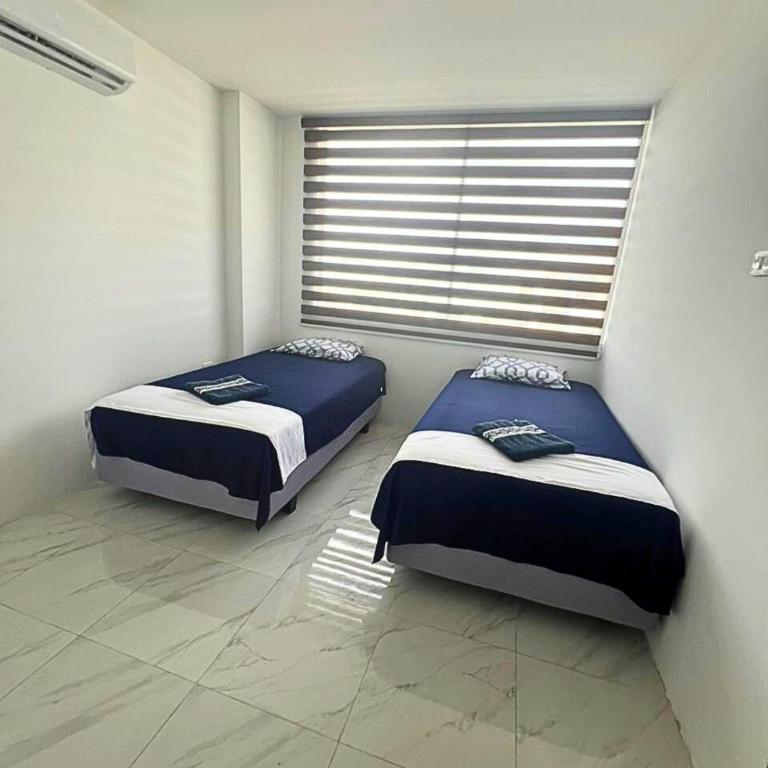 Casa Familiar a Pasos del Mar Playa y Felicidad - Three-Bedroom House - 58