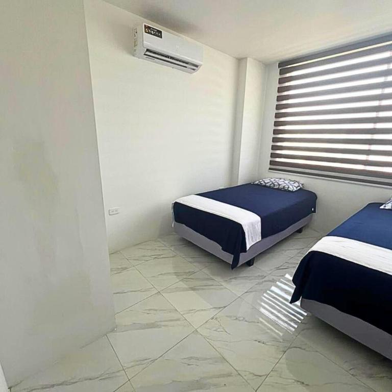 Casa Familiar a Pasos del Mar Playa y Felicidad - Three-Bedroom House - 59