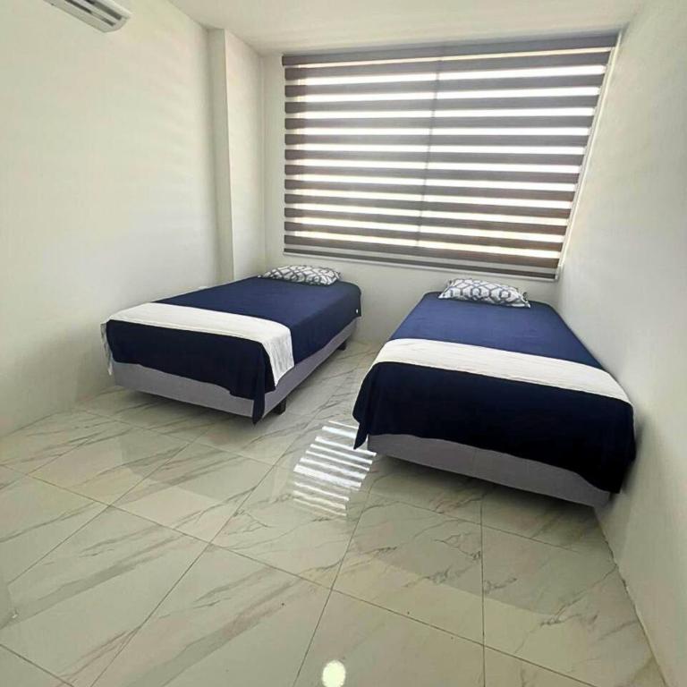 Casa Familiar a Pasos del Mar Playa y Felicidad - Three-Bedroom House - 57