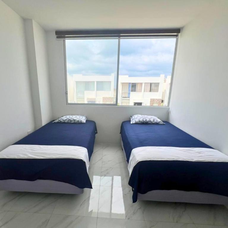 Casa Familiar a Pasos del Mar Playa y Felicidad - Three-Bedroom House - 62