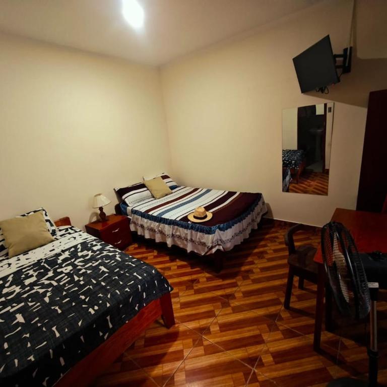 Casa Familiar con piscina - Three-Bedroom Apartment - 8