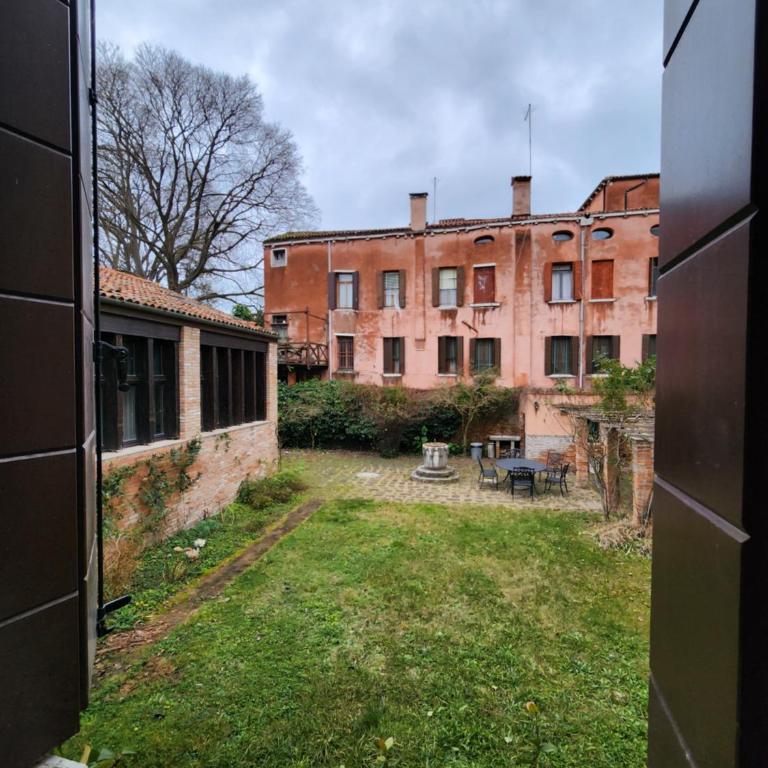 Zen Accommodations Grand Canal - Camera Tripla con Vista Giardino - 9