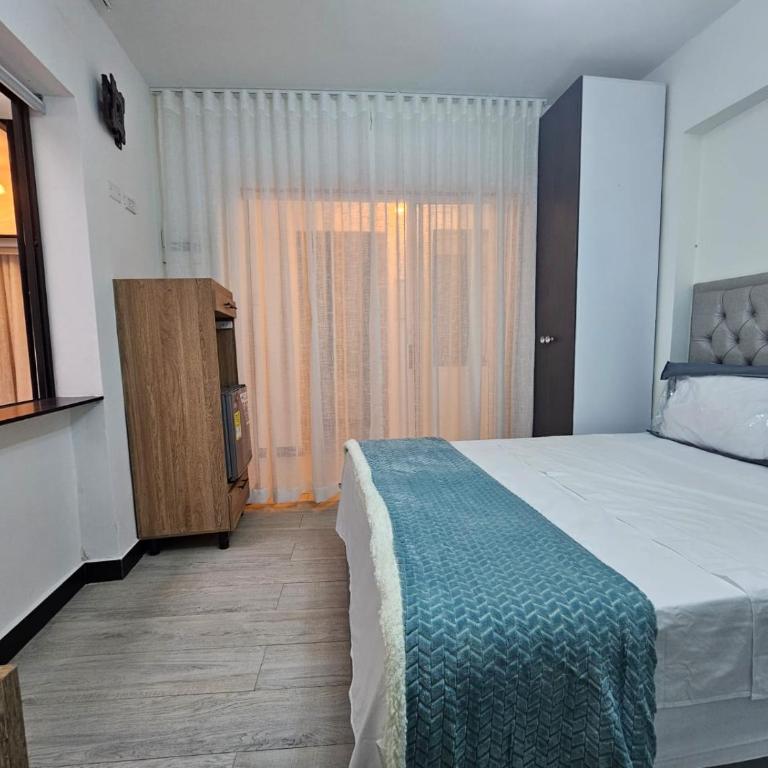 Hotel Suites de luxury Calasanz Medellín - Deluxe Queen Room - 1