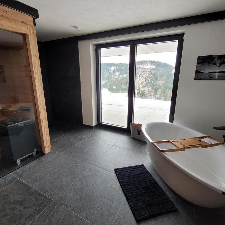 Alpinchalet Bergahorn - luxeriöse Wohnung mit Sauna und grosser Terrasse - Apartment mit 3 Schlafzimmern - 56