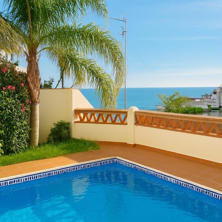 Gran terraza con vistas al mar, piscina y parking privado - Apartamento de 2 dormitorios - 16