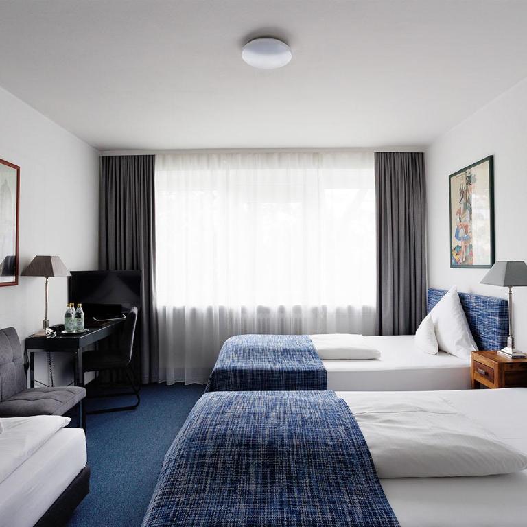 Hotel Nymphenburg City - München - Dreibettzimmer - 2
