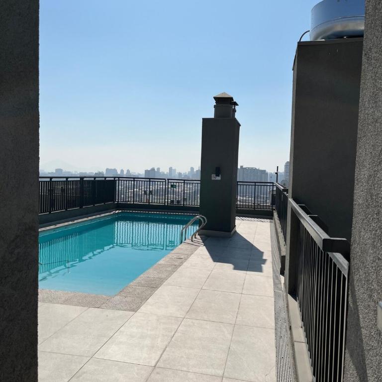 Checkinchile D1111 centrico depto con piscina y cerca de metro - One-Bedroom Apartment - 1