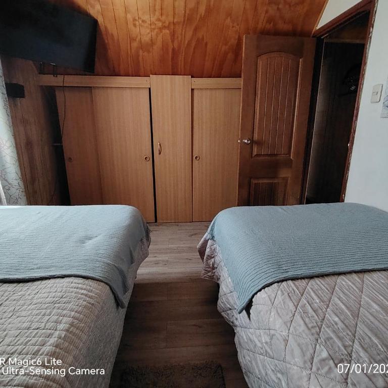 Descanso Sureño Hospedaje - Habitación Estándar con baño compartido - 2 camas - 5