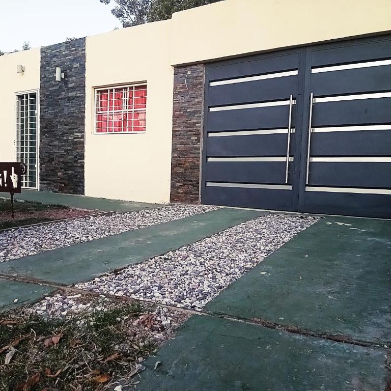 Hospedaje ES ACA - Three-Bedroom House - 1