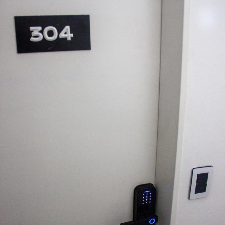 LakeHouse Hotel & Suites - Habitación Cuádruple Confort - 5