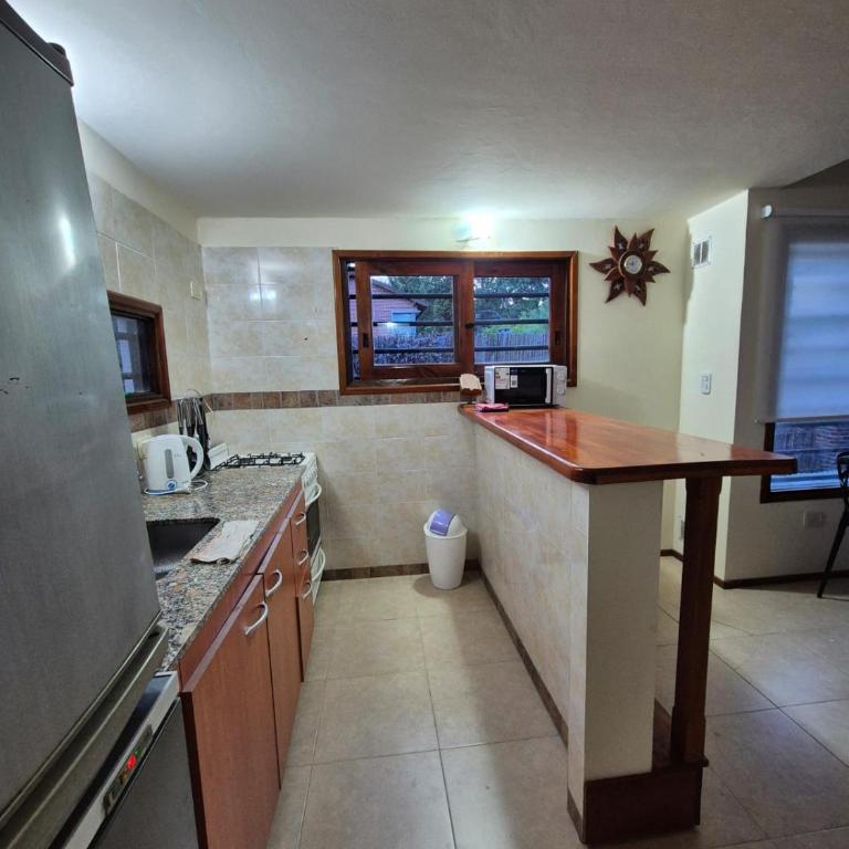 Dúplex con cochera y parrilla cerca de la playa - Two-Bedroom Apartment - 26