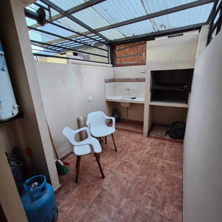 Dúplex con cochera y parrilla cerca de la playa - Two-Bedroom Apartment - 28