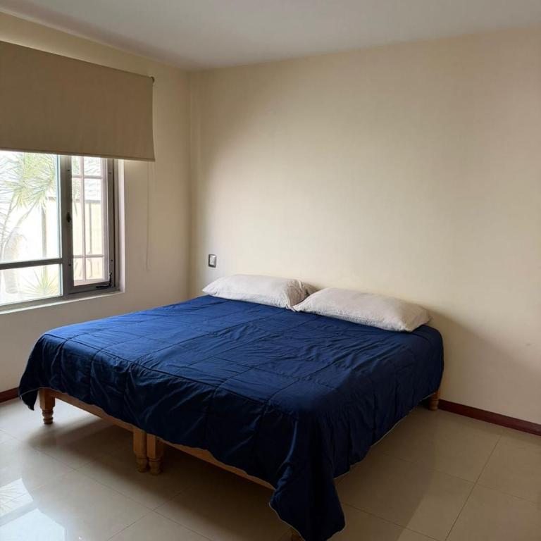 Casa a 10 min del estadio - Four-Bedroom House - 10
