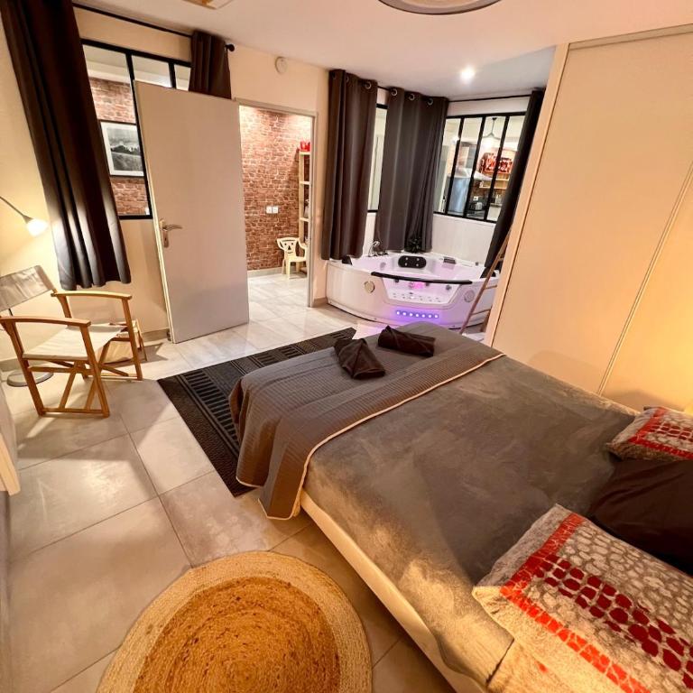 Loft jacuzzi à 8 min des Grands Buffets et du centre-ville - Appartamento Loft con 2 Camere da Letto - 6