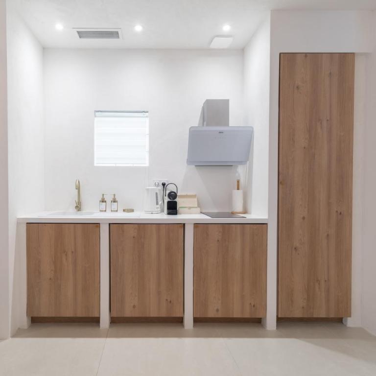 Suite romantique Santorini avec Balnéo & Sauna - Appartement 1 Chambre - 24