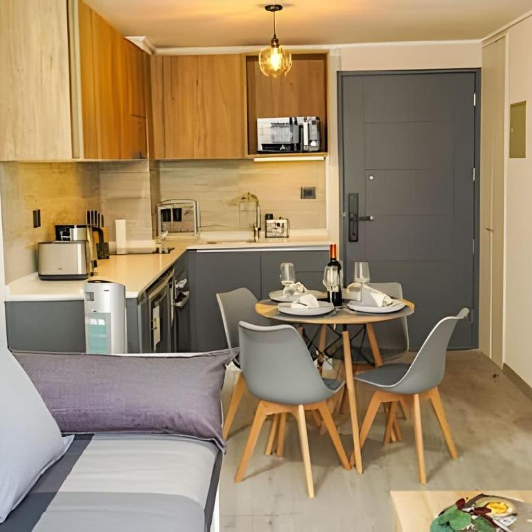 Modern Apartment with Terrace | Steps from Movistar Arena & Barrio Universitario | Up to 4 Guests - One-Bedroom Apartment with Balcony - 1