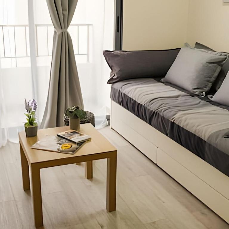 Modern Apartment with Terrace | Steps from Movistar Arena & Barrio Universitario | Up to 4 Guests - One-Bedroom Apartment with Balcony - 17